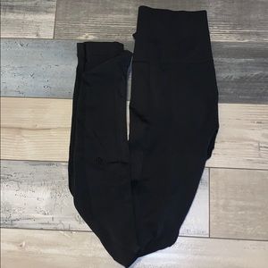 Black High Waisted Lulu Lemon Leggings with holes